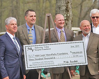 The Mill Creek MetroParks Golf Course in Youngstown was added to the list of park venues with a named endowment thanks to a $300,000 contribution from the Mahoning Valley Hospital Foundation that was announced Wednesday. From left at the check presentation Wednesday are Aaron Young, Ned Underwood, Judge Robert Rusu, Brian Tolner, Mike Senchak, Mark Winick and Jim Keating.