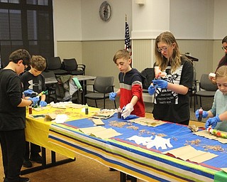 Neighbors | Abby Slanker.Tweens and teens enjoyed tie dying socks and large handkerchiefs during the Canfield library’s totally tie dye event on March 18.