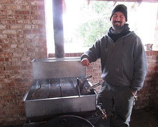 Neighbors | Jessica Harker.Boardman Park employee Pete Cordon demonstrated how to make Maple Syrup March 24 at the park's annual Maple Syrup Festival.