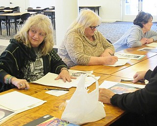 Neighbors | Jessica Harker.Community members gathered at the Austintown library on April 2 for Potrait Drawing Two hosted by librarian Andrea Zupcsan.