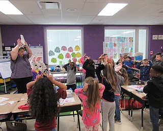 Neighbors | Jessica Harker.Austintown Elementary School PTA volunteers had students practice their bunny ears April 12 during the annual visit from the Easter Bunny.