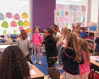 Neighbors | Jessica Harker.Students practiced their Easter Bunny hop during a visit from the bunny sponsored by the Austintown Elementary School PTA April 12.