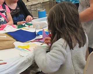 Neighbors | Jessica Harker.Children decorated the pieces of their felt storyboards on April 19 at the Boardman library's Felt Fun event.