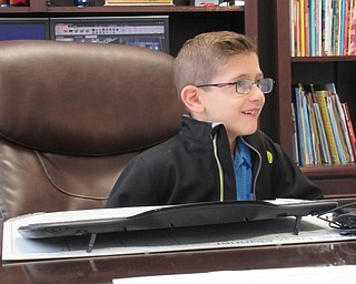 Neighbors | Jessica Harker.Second grader Aiden McDonald was the first of three students at Poland Union Elementary School to be selected as principal for the day April 24.