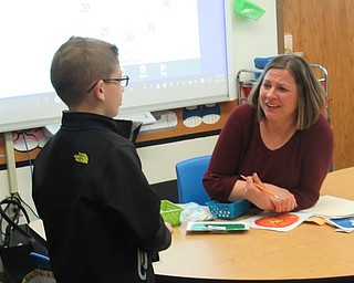 Neighbors | Jessica Harker.As principal for the day Aiden McDonald walked around Poland Union Elementary School meeting with teacher and checking on students April 24.