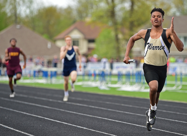CORTLAND, OHIO - MAY 2, 2019: Harding's MarKwuan Brown sprints to the finish line to win the boys 4x200 meter relay, Thursday afternoon during the Trumbull County Track Meet at Lakeview High School. DAVID DERMER | THE VINDICATOR