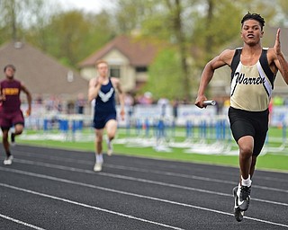 CORTLAND, OHIO - MAY 2, 2019: Harding's MarKwuan Brown sprints to the finish line to win the boys 4x200 meter relay, Thursday afternoon during the Trumbull County Track Meet at Lakeview High School. DAVID DERMER | THE VINDICATOR