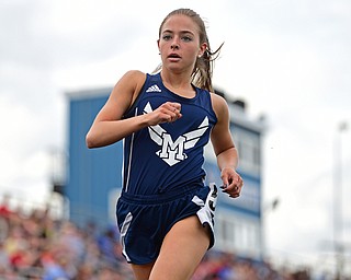 CORTLAND, OHIO - MAY 2, 2019: McDonald's Anna Guerra runs to the finish line to win her heat of the girl 1600 meter run, Thursday afternoon during the Trumbull County Track Meet at Lakeview High School. DAVID DERMER | THE VINDICATOR