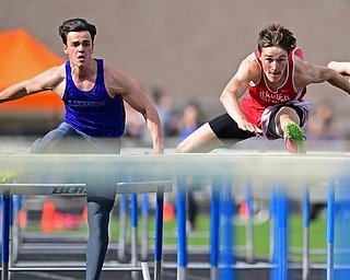 CORTLAND, OHIO - MAY 2, 2019: Badger's Brandon Greathouse, right, and Lakeview's Liam Boivin compete during the boys 110 meter hurdles, Thursday afternoon during the Trumbull County Track Meet at Lakeview High School. DAVID DERMER | THE VINDICATOR