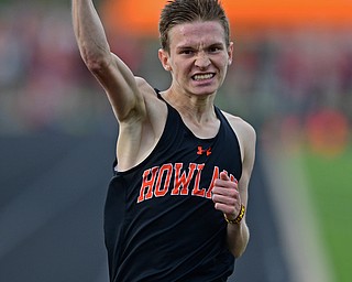 CORTLAND, OHIO - MAY 2, 2019: Howland's Vincent Mauri celebrates while crossing the finish line to win his heat of the boys 1600 meter run, Thursday afternoon during the Trumbull County Track Meet at Lakeview High School. DAVID DERMER | THE VINDICATOR