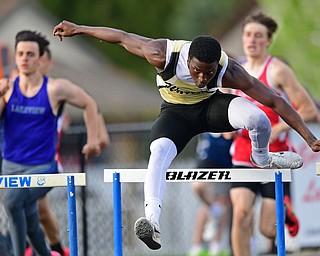 CORTLAND, OHIO - MAY 2, 2019: Harding's JeSean Sledge competes during the boys 300 meter hurdles, Thursday afternoon during the Trumbull County Track Meet at Lakeview High School. DAVID DERMER | THE VINDICATOR