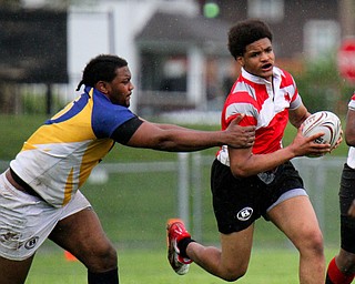 William D. Lewis the Vindicator Chaney's Jason Jckson(9) is pursued by East's Turhan Henderson(5).