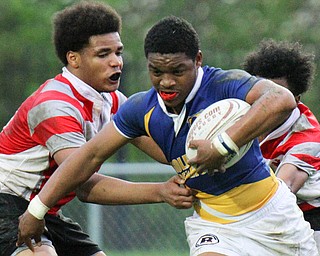 William D. Leows The Vindicator  ast's Vincent Steele(15) eludes Chaney's Rashawn Perkins(15).