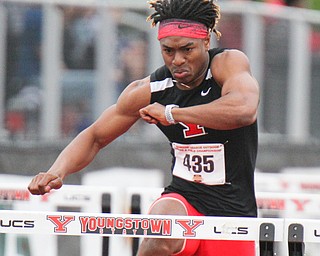 William D. Lewis The Vindicator YSU's Collin Harden competes in 110 high hurdles