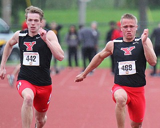 William D. Lewis The Vindicator YSU's Chad Zallow (468) during 100 . at left is Brendan Lucas(442).