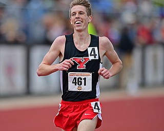 YOUNGSTOWN, OHIO - MAY 5, 2019: Youngstown State's Ryan Sullivan smiles while crossing the finish line to place second during the Men's 5000 meter, Sunday afternoon during the Horizon League Outdoor Track Championship at the Youngstown State Sports Complex. DAVID DERMER | THE VINDICATOR