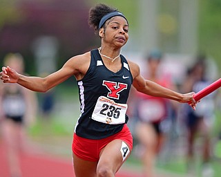 YOUNGSTOWN, OHIO - MAY 5, 2019: Youngstown State's Jaliyah Elliott crosses the finish line to win the women's 4x100 meter relay, Sunday afternoon during the Horizon League Outdoor Track Championship at the Youngstown State Sports Complex. DAVID DERMER | THE VINDICATOR