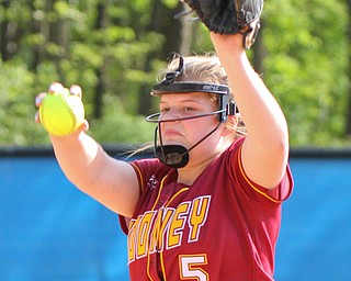 William D. Lewis The Vindictor  Mooney's Alaina Francis(5) delivers. Mooney won 8-3 at Fitch 5-6-19..