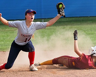 William D. Lewis The Vindictor Fitch's Elyssa Molody (14) reacts after tagging Mooney's Lexi Diaz(11). Mooney won 8-3 at Fitch 5-6-19..