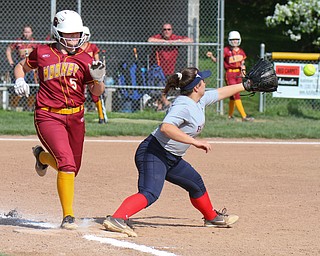 William D. Lewis The Vindictor  Mooney'sAlaina Francis(5) is safe at 1rst as Fitch's Maddy Taylor waits for the throw .Mooney won 8-3 at Fitch 5-6-19.