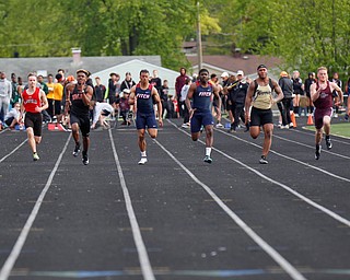 The second section of the Boys 100 Meter Dash takes place at the All-American Conference Red Tier High School Track Championships at Austintown Fitch Greenwood Chevrolet Falcon Stadium on Tuesday. EMILY MATTHEWS | THE VINDICATOR