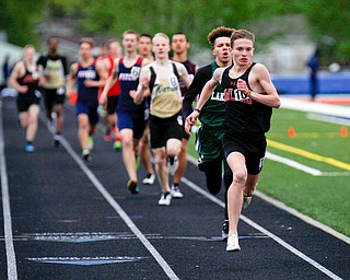 Howland's Vincent Mauri leads the pack during the Boys 800 Meter Run at the All-American Conference Red Tier High School Track Championships at Austintown Fitch Greenwood Chevrolet Falcon Stadium on Tuesday. EMILY MATTHEWS | THE VINDICATOR