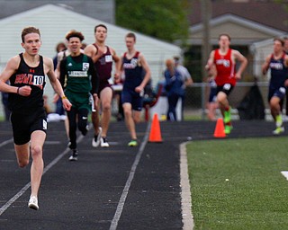 Howland's Vincent Mauri leads the pack during the Boys 800 Meter Run at the All-American Conference Red Tier High School Track Championships at Austintown Fitch Greenwood Chevrolet Falcon Stadium on Tuesday. EMILY MATTHEWS | THE VINDICATOR