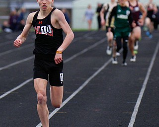 Howland's Vincent Mauri finishes in first for the Boys 800 Meter Run at the All-American Conference Red Tier High School Track Championships at Austintown Fitch Greenwood Chevrolet Falcon Stadium on Tuesday. EMILY MATTHEWS | THE VINDICATOR