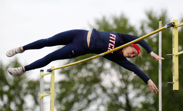 Austintown Fitch's Madison Skelly pole vaults at the All-American Conference Red Tier High School Track Championships at Austintown Fitch Greenwood Chevrolet Falcon Stadium on Tuesday. EMILY MATTHEWS | THE VINDICATOR