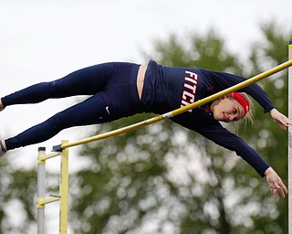 Austintown Fitch's Madison Skelly pole vaults at the All-American Conference Red Tier High School Track Championships at Austintown Fitch Greenwood Chevrolet Falcon Stadium on Tuesday. EMILY MATTHEWS | THE VINDICATOR