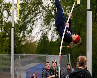 Austintown Fitch's Madison Skelly pole vaults at the All-American Conference Red Tier High School Track Championships at Austintown Fitch Greenwood Chevrolet Falcon Stadium on Tuesday. EMILY MATTHEWS | THE VINDICATOR