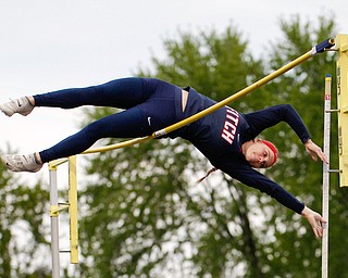 Austintown Fitch's Madison Skelly pole vaults at the All-American Conference Red Tier High School Track Championships at Austintown Fitch Greenwood Chevrolet Falcon Stadium on Tuesday. EMILY MATTHEWS | THE VINDICATOR