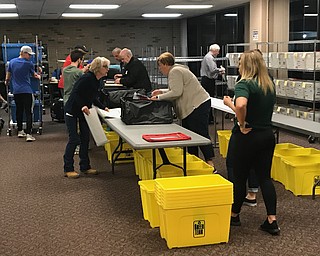 Despite the lack of live vote counts in the past 90 minutes, workers at the Mahoning County Board of Elections are counting votes cast in today's election.