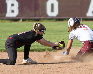 Dana Haus of Boardman High School gets past Canfield High School's Jackie Kinnick's tag to safely steal second base during their game at Boardman on Wednesday. Boardman won 6-0. 