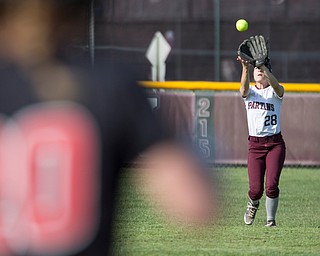 Boardman's Vanessa Roush catches a ball hit by Canfield's Kalin Kovach during their game at Boardman on Wednesday. Boardman won 6-0. EMILY MATTHEWS | THE VINDICATOR