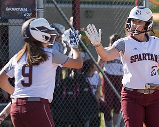 Boardman's Jenna Olexa, right, and Dana Haus high-five after Haus scores during their game against Canfield on Wednesday. Boardman won 6-0. EMILY MATTHEWS | THE VINDICATOR