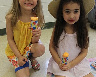 Neighbors | Abby Slanker.Two C.H. Campbell Elementary School kindergarten students enjoyed push-ups provided by the PTA as a treat during the school’s annual Beach Day on April 18.