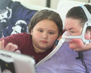 Christine Terlesky and her daughter Emma shop via computer.