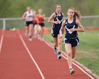 McDonald's Anna Guerra runs the Girls 3200 Meter Run with McDonald's Sophie Klase behind her at the Mahoning Valley Athletic Conference High School League Championship Meet at Western Reserve High School on Thursday. EMILY MATTHEWS | THE VINDICATOR