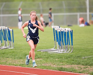 McDonald's Anna Guerra keeps the lead during the Girls 3200 Meter Run at the Mahoning Valley Athletic Conference High School League Championship Meet at Western Reserve High School on Thursday. EMILY MATTHEWS | THE VINDICATOR