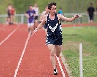 McDonald's Connor Symbolik keeps the lead during the Boys 3200 Meter Run at the Mahoning Valley Athletic Conference High School League Championship Meet at Western Reserve High School on Thursday. EMILY MATTHEWS | THE VINDICATOR