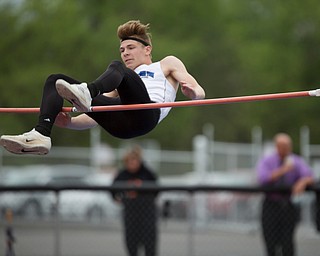 Jackson Milton's Ryan Staton attempts to clear the high jump at the Mahoning Valley Athletic Conference High School League Championship Meet at Western Reserve High School on Thursday. EMILY MATTHEWS | THE VINDICATOR