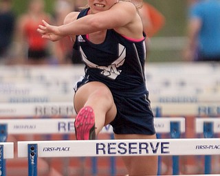 McDonald's Naomi Domitrovich finishes in the lead for the Girls 100 Meter Hurdles at the Mahoning Valley Athletic Conference High School League Championship Meet at Western Reserve High School on Thursday. EMILY MATTHEWS | THE VINDICATOR