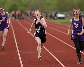 From left, Seb. McKinley's Mary Quinn, McDonald's Anastasia Christiansen, and Seb. McKinley's Kalyn Mudrick compete in the first section of the Girls 100 Meter Dash at the Mahoning Valley Athletic Conference High School League Championship Meet at Western Reserve High School on Thursday. Christiansen finished in first. EMILY MATTHEWS | THE VINDICATOR