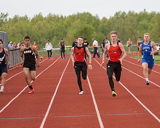 From left, Jackson Milton's Sean Lengyel, McDonald's Dominic Scbadl, Mineral Ridge's John Beshara, Springfield's, Zach Ebert, Springfield's Garrett Walker, Western Reserve's Jimmy Mayberry, Mineral Ridge's Triston Weiss, and Waterloo's Joe Thomas compete in the second section of the Boys 100 Meter Dash at the Mahoning Valley Athletic Conference High School League Championship Meet at Western Reserve High School on Thursday. Walker finished in first. EMILY MATTHEWS | THE VINDICATOR