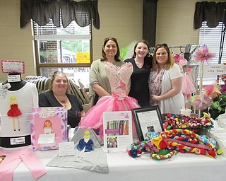 Neighbors | Jessica Harker .Employee's pf Diva Donations located at 11836 South Ave. were present at Austintown's Mothers Day Farmers Market where they hosted a free dress up station.
