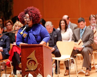 Monica Jones, the dean of Youngstown Rayen Early College, gives opening remarks during the Class of 2019 commencement ceremony in DeYor 's Ford Recital Hall on Friday. EMILY MATTHEWS | THE VINDICATOR