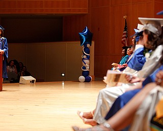Salutatorian Lanae' Ferguson addresses her fellow graduates during her student reflection at the Youngstown Rayen Early College Class of 2019 commencement ceremony in DeYor 's Ford Recital Hall on Friday. EMILY MATTHEWS | THE VINDICATOR