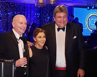 Mary Pipino of Youngstown submitted the winning $35,000 bid to purchase the last Lordstown-produced Chevrolet Cruze. The announcement was made Friday night at the United Way of Youngstown and the Mahoning Valley's gala at the Lake Club in Poland. At left, is Bob Hannon, United Way president, and Ed Muransky, local entrepreneur.