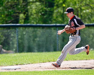 Springfield's Nick Slike runs the ball to third for an out during their game against South Range on Saturday at Springfield High School. Springfield won in the 10th inning 9-8. EMILY MATTHEWS | THE VINDICATOR